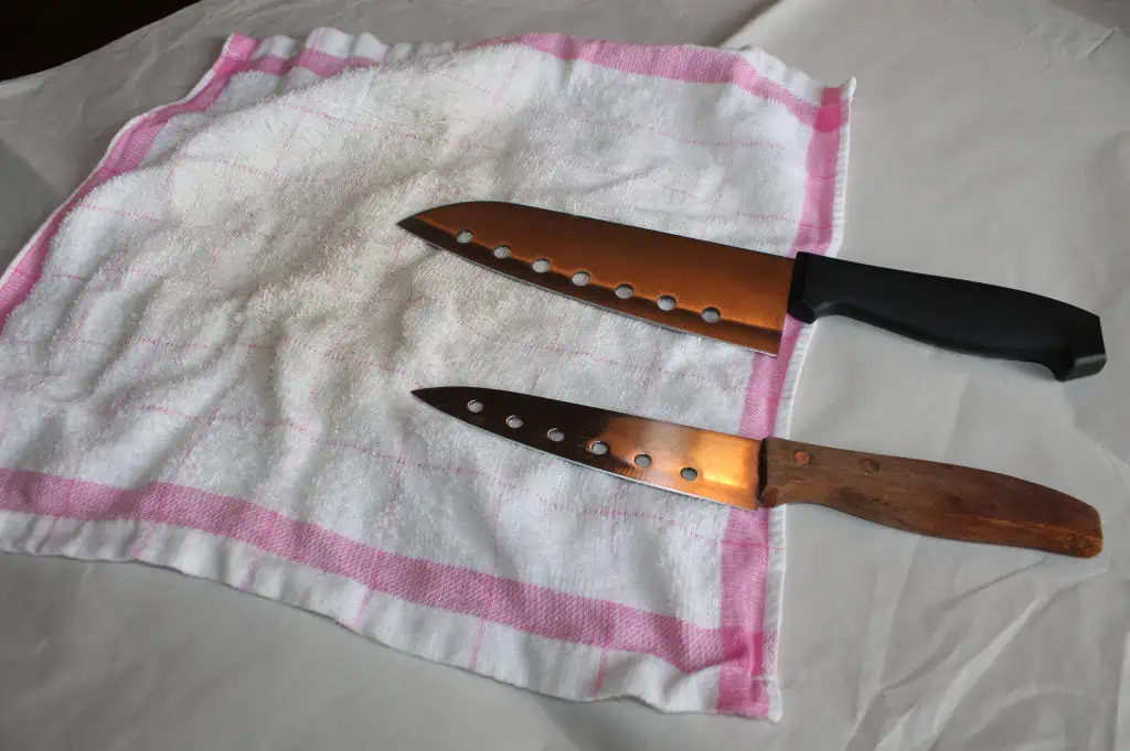 How do I pack knives safely - step 2, wrap together in a towel or packing paper