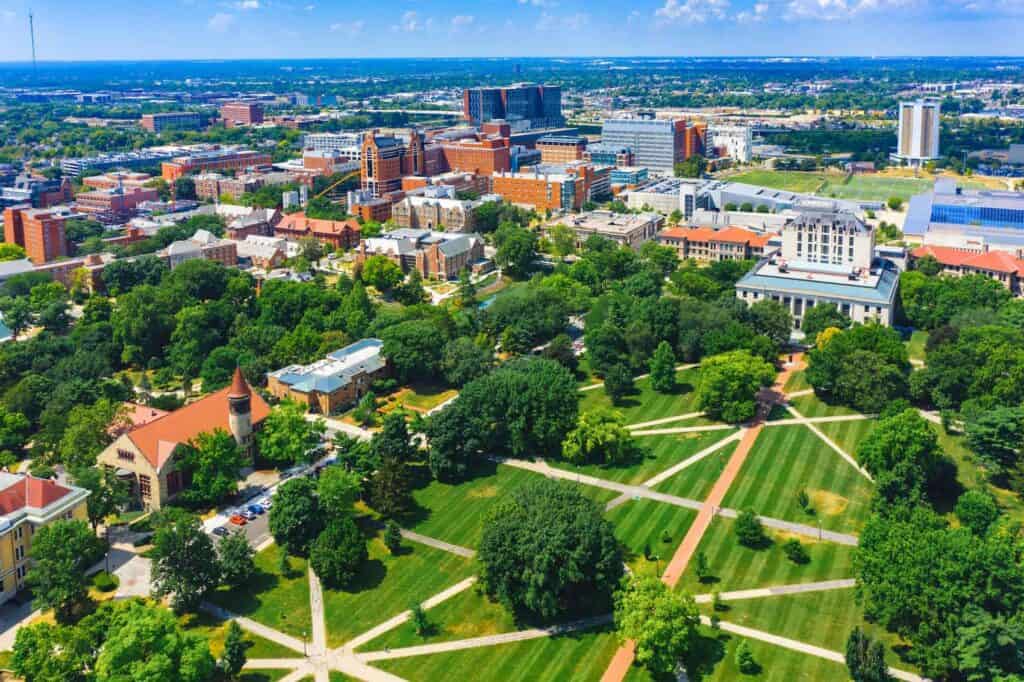 an overhead view of a university campus lawn square, surrounded by buildings in the rest of the city in Columbus, OH