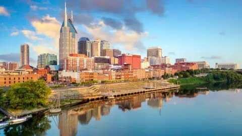 A view of Nashville, TN's skyline over the Cumberland River