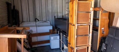 A storage unit filled with furniture