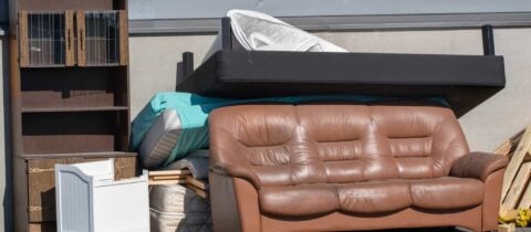 several types of furniture sit against a wall