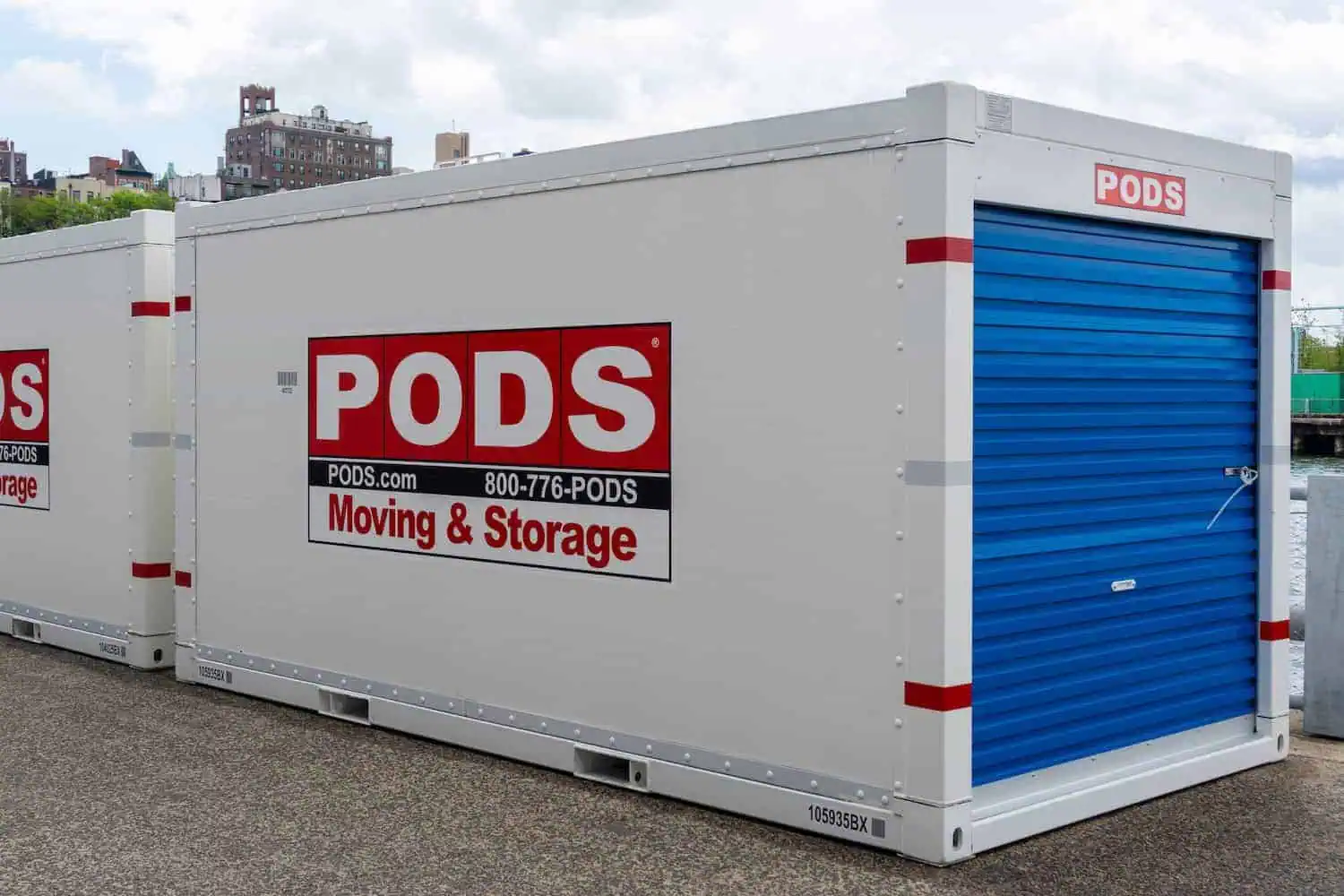 A PODS container sits in a parking lot