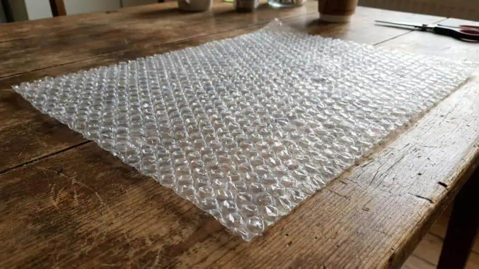An illustration of bubble wrap laying flat on a table with the bubbles pointing up.
