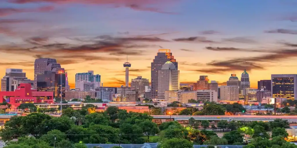 San Antonio's skyline during a sunset.
