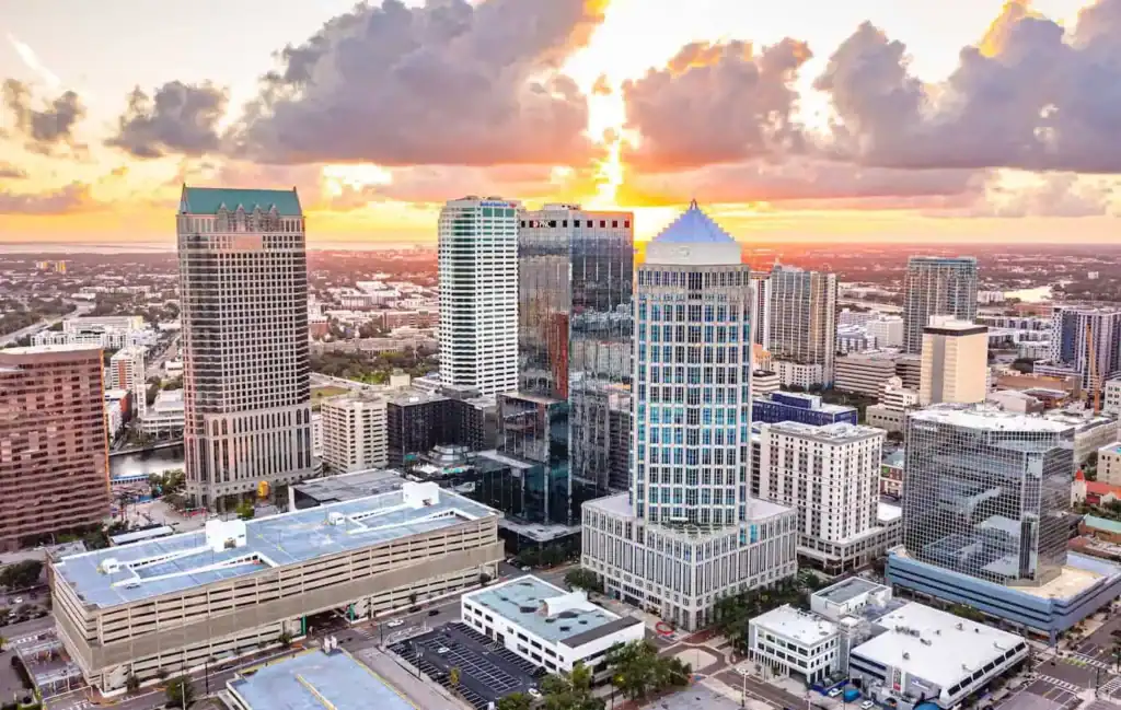 Aerial shot of downtown Tampa during a bright beautiful sunset.