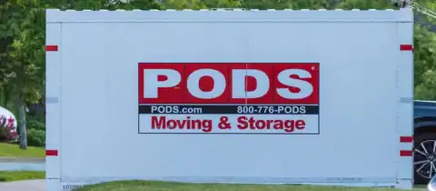 PODS moving and storage container placed in front of a home