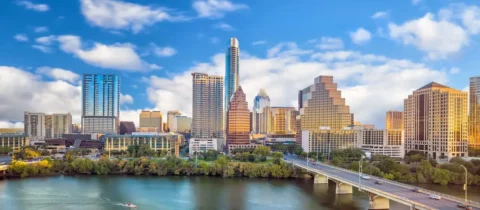 Austin, TX skyline overlooking Lady Bird Lake on a clear day