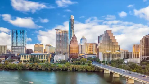 Austin, TX skyline overlooking Lady Bird Lake on a clear day