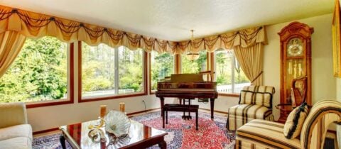 An old-fashioned living room filled with antique furniture